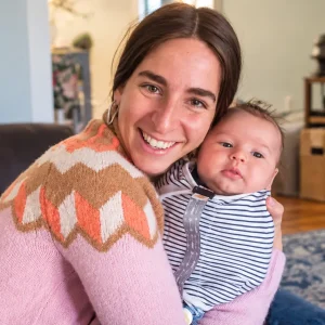 Judy Ribner holding a baby 8