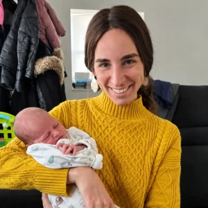 Judy holding a baby 7